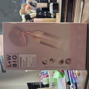 Vibrating rose quartz facial massager